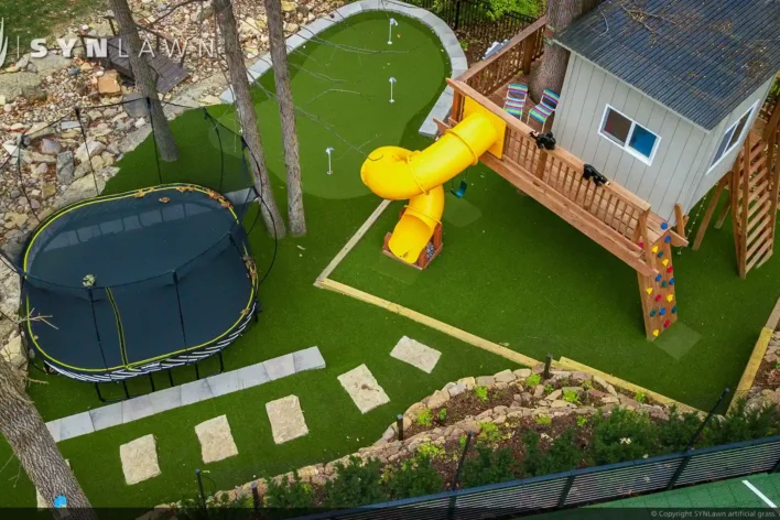 image of SYNLawn residential backyard treehouse trampoline