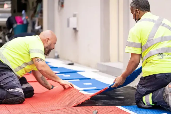 image of SYNCourt tile sport system being installed